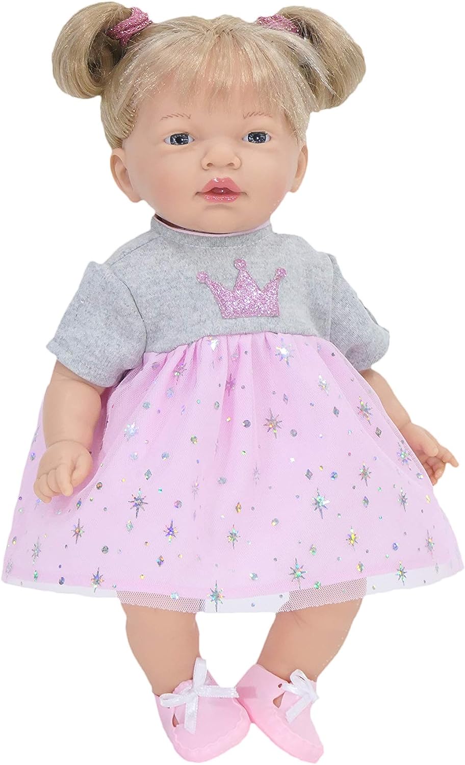 Nines Artesanals d'Onil in pink dress